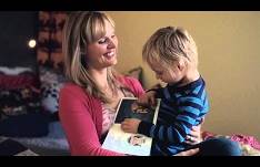 Mother holding a young child